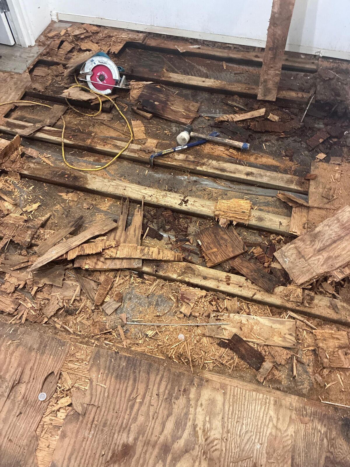 Damaged floor and subfloor before preparation