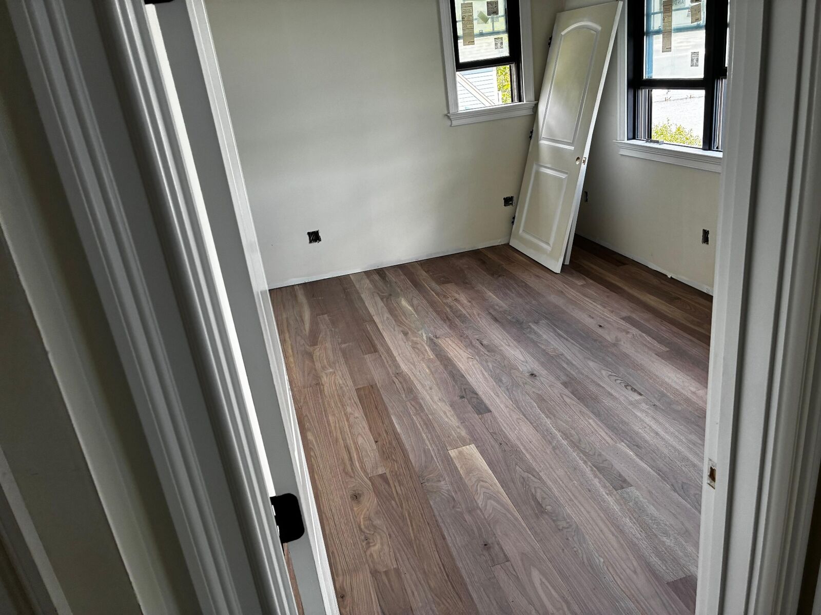 Bedroom flooring installation completed by Cordeiro Flooring
